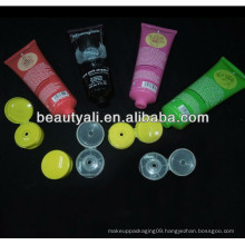 Colored cosmetic tube for sunblock lotion